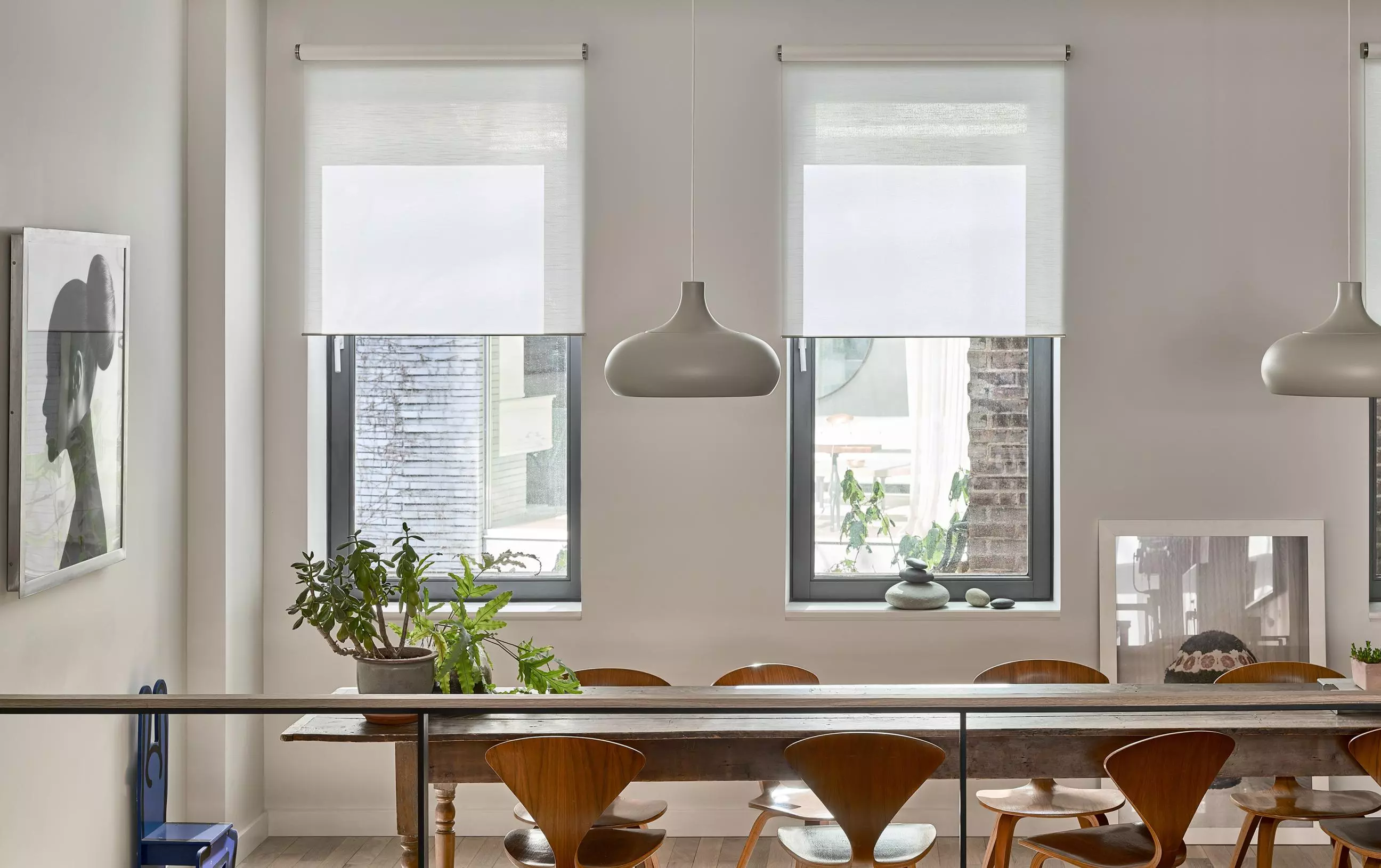 Palladiom motorized shades in luxury bedroom